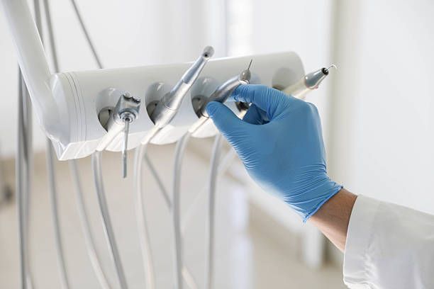 Professional Tooth Extraction technician working in Hesston, KS